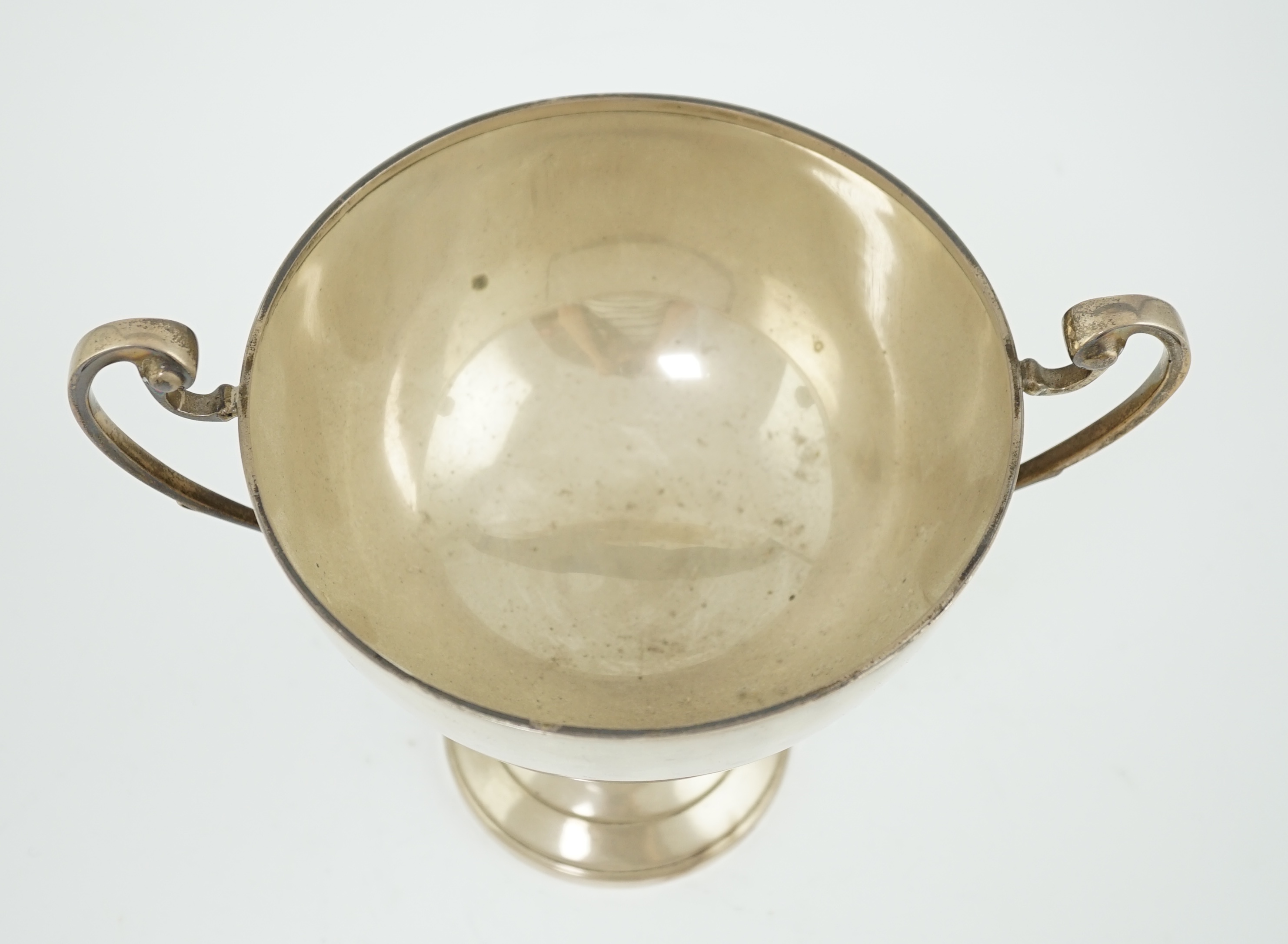 A George V silver two handled pedestal trophy cup, by Martin, Hall & Co Ltd